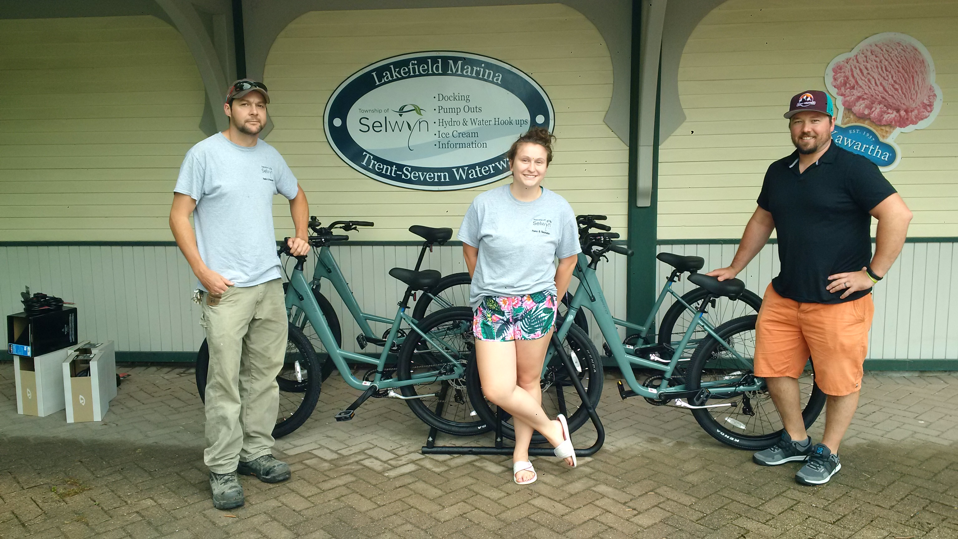 Photo of Township staff with bicycles for rent