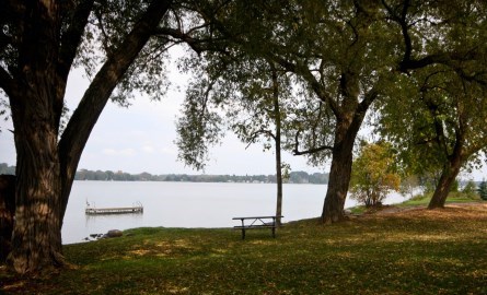 Beach at a lakefront with swimming platform